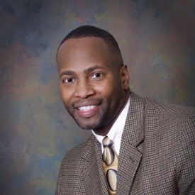 Charles E. Moore, MD